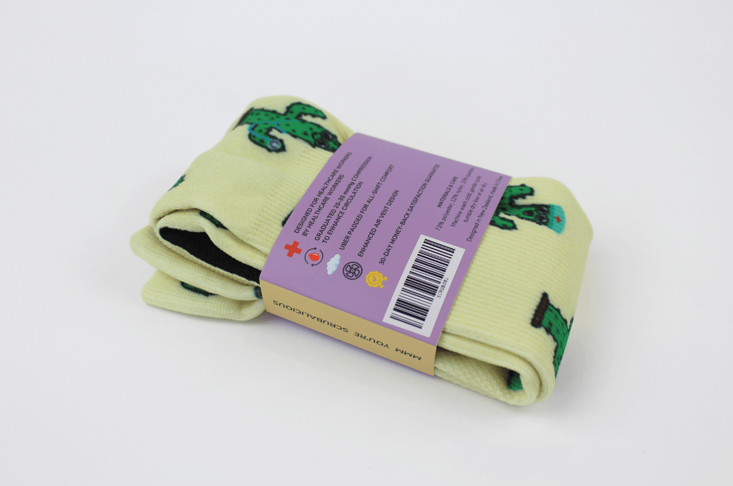 Cactus party compression socks for nurses in packaging viewed from the back showing product specifications.