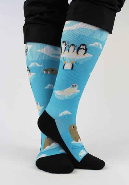 Compression socks for nurses with a polar theme, front view with feet together showing 20-30mmHg compression.