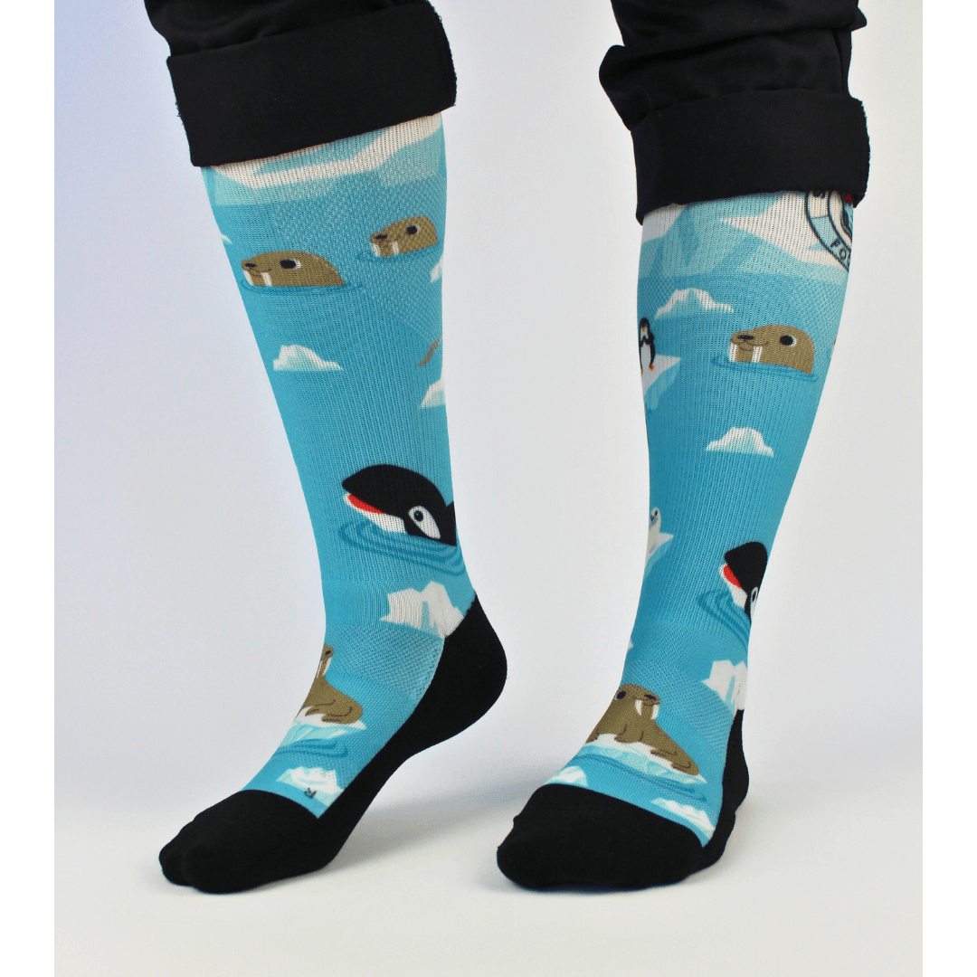 Compression socks for nurses with a polar theme, front view with feet apart.